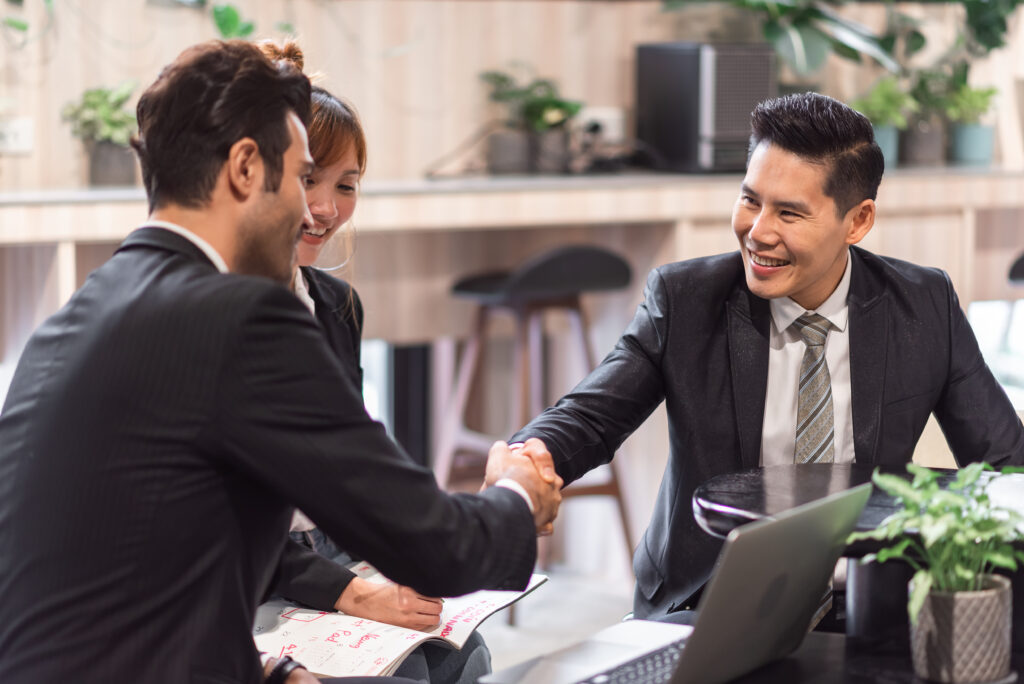 Team of professionals in discussion – employee retention and replacement