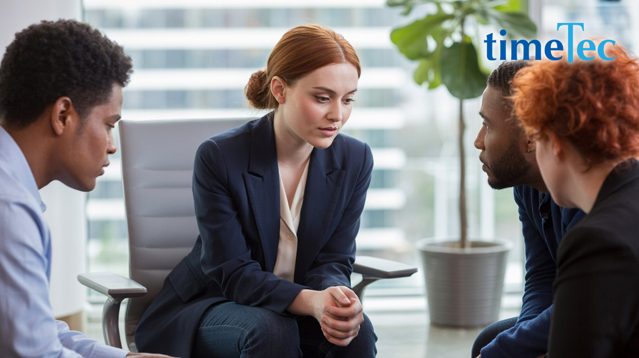 Team discussion showing engaged employees in a supportive workplace environment