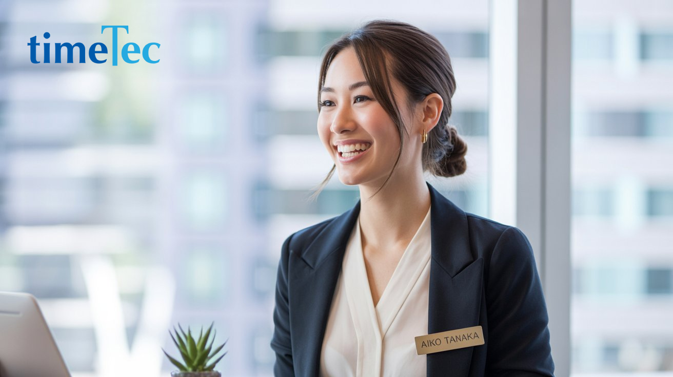 Smiling employee in office setting representing streamlined HRMS for public holidays and overtime