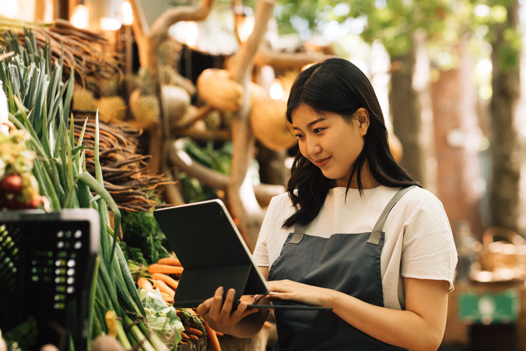Retail worker using HRMS system for public holidays and overtime tracking