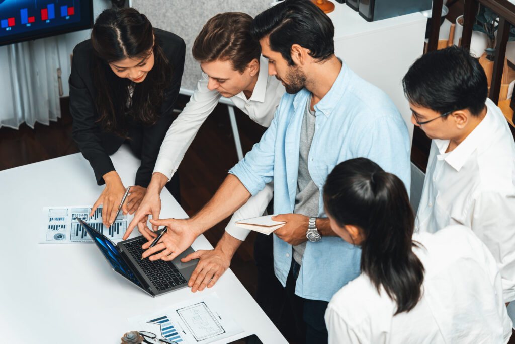 HR professionals collaborating with other departments to build a strong HR team