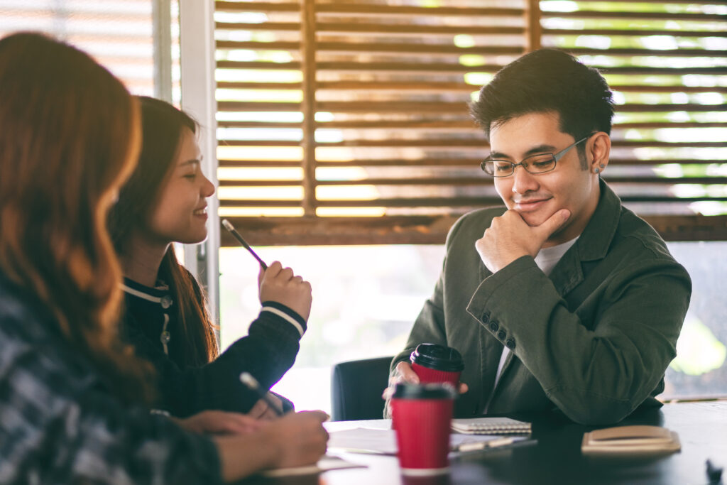 Joint Management Body Malaysia committee discussing property updates and maintenance plans during a meeting