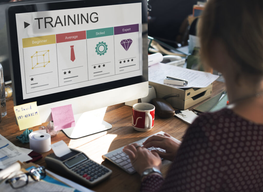 Employee completing online training course to enhance workplace skills and performance